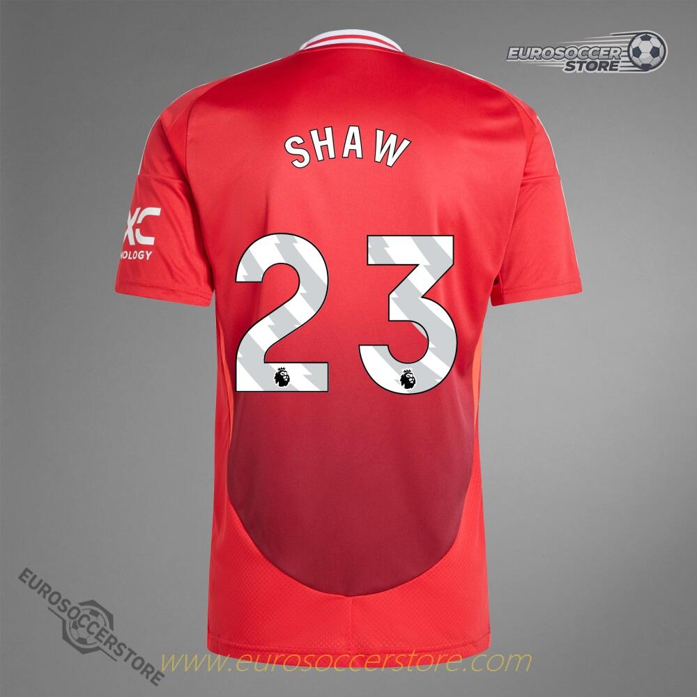 The 24-25 Home Jersey of Manchester United featuring SHAW with the number 23.