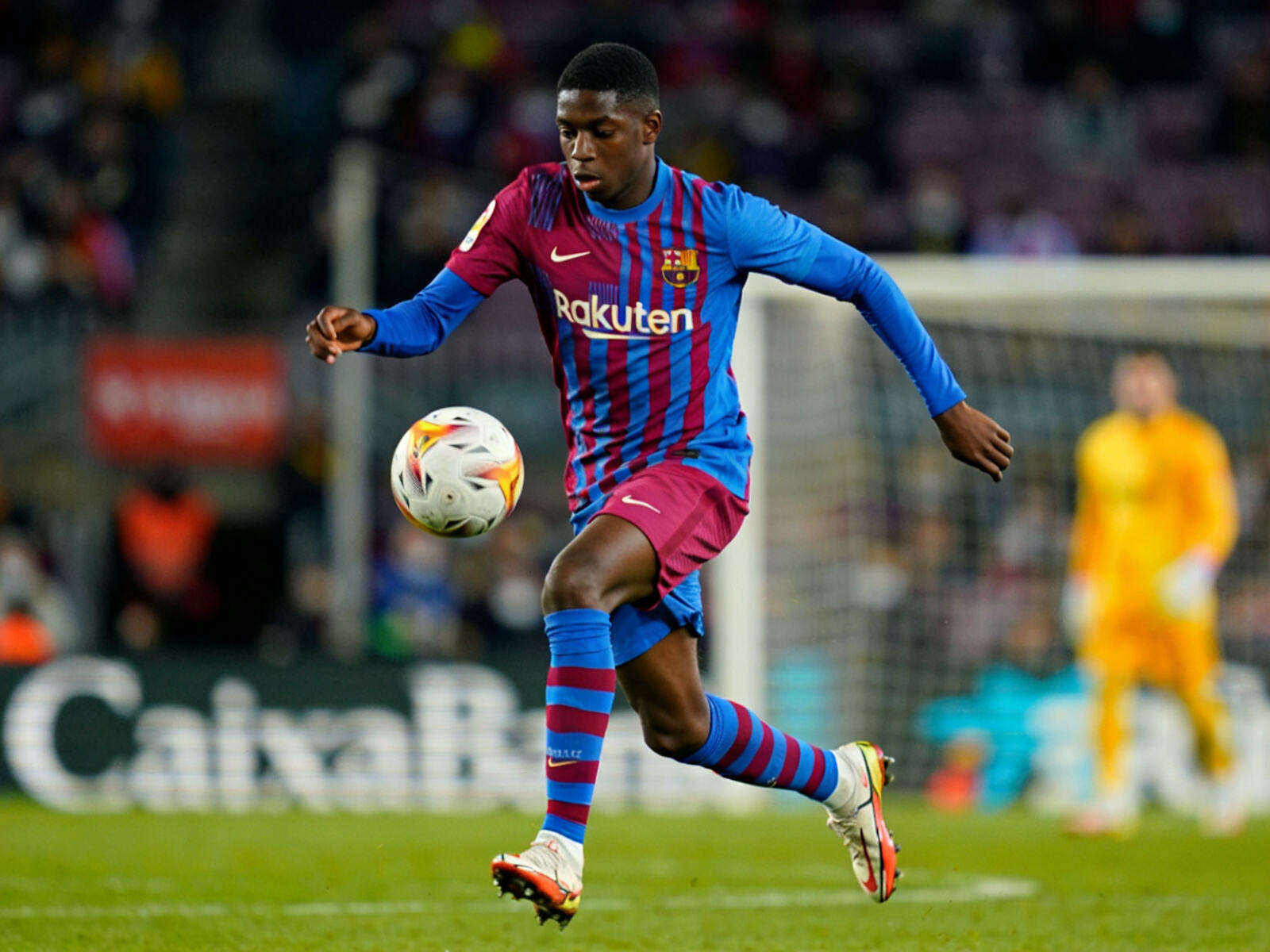 Teenage sensation Lamine Yamal demonstrates his fearless dribbling skills in a Barcelona kit. The perfect jersey for fans investing in football&rsquo;s exciting future.