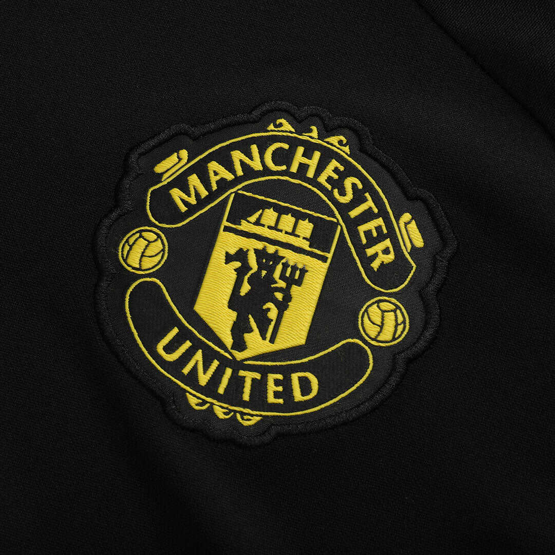 Manchester United 1/4 Zip Tracksuit 2025/26 Kids Black