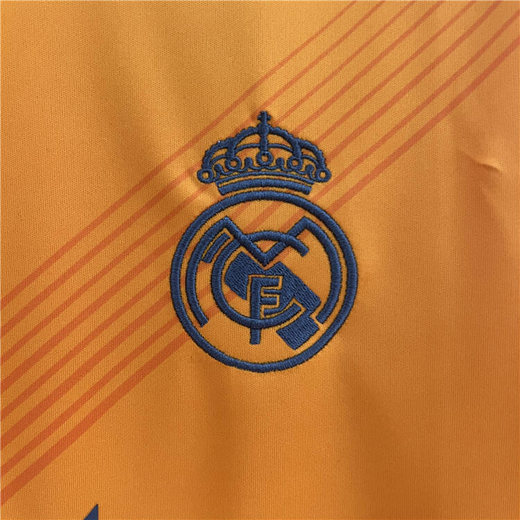 Real Madrid 2425 Away Orange Shirt - Official Replica 24611