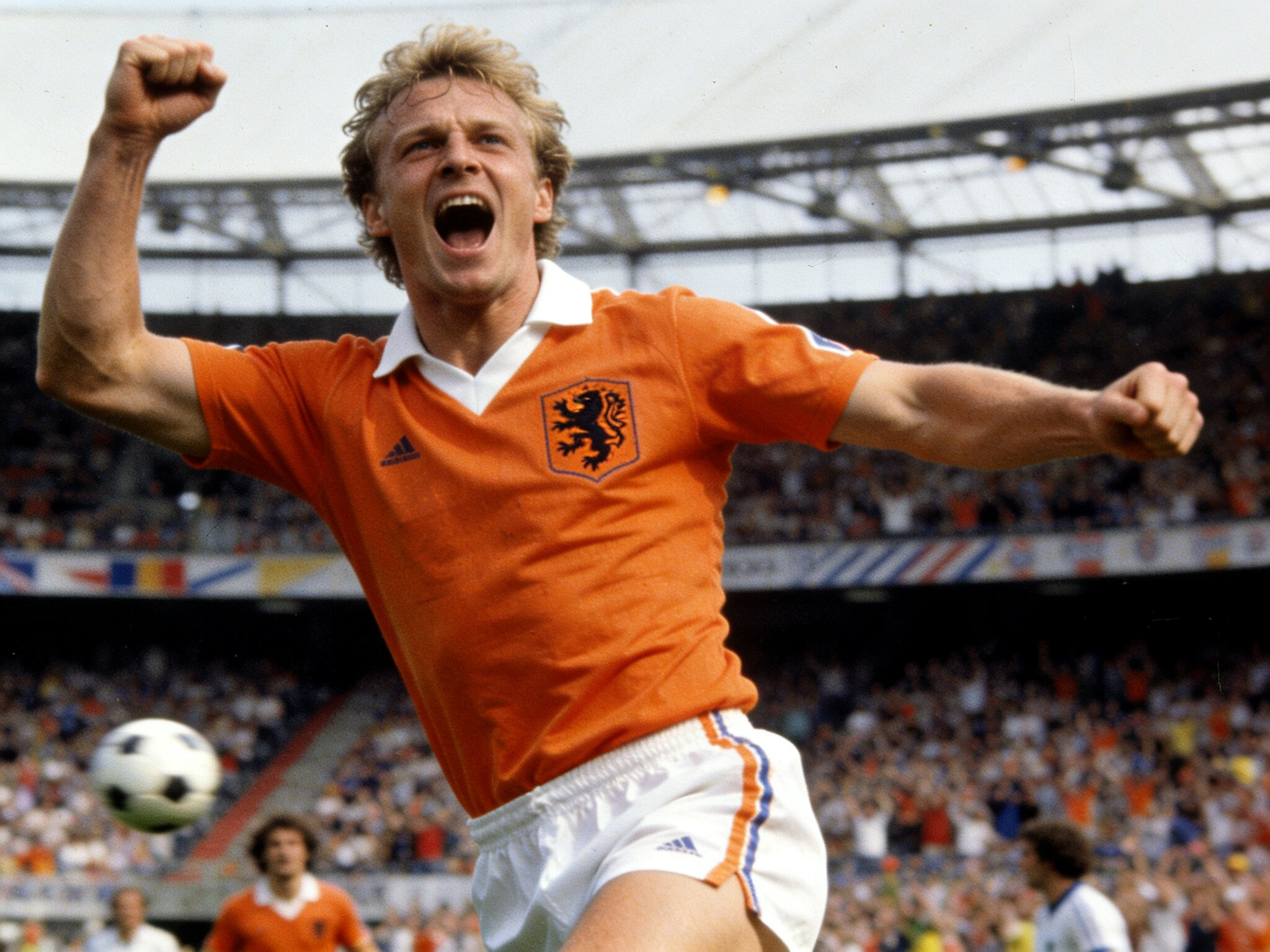 Marco van Basten of the Netherlands celebrating his spectacular volley goal in the UEFA Euro 1988 final, wearing the iconic solid bright orange jersey with a white collar, embodying the peak of Total Football.