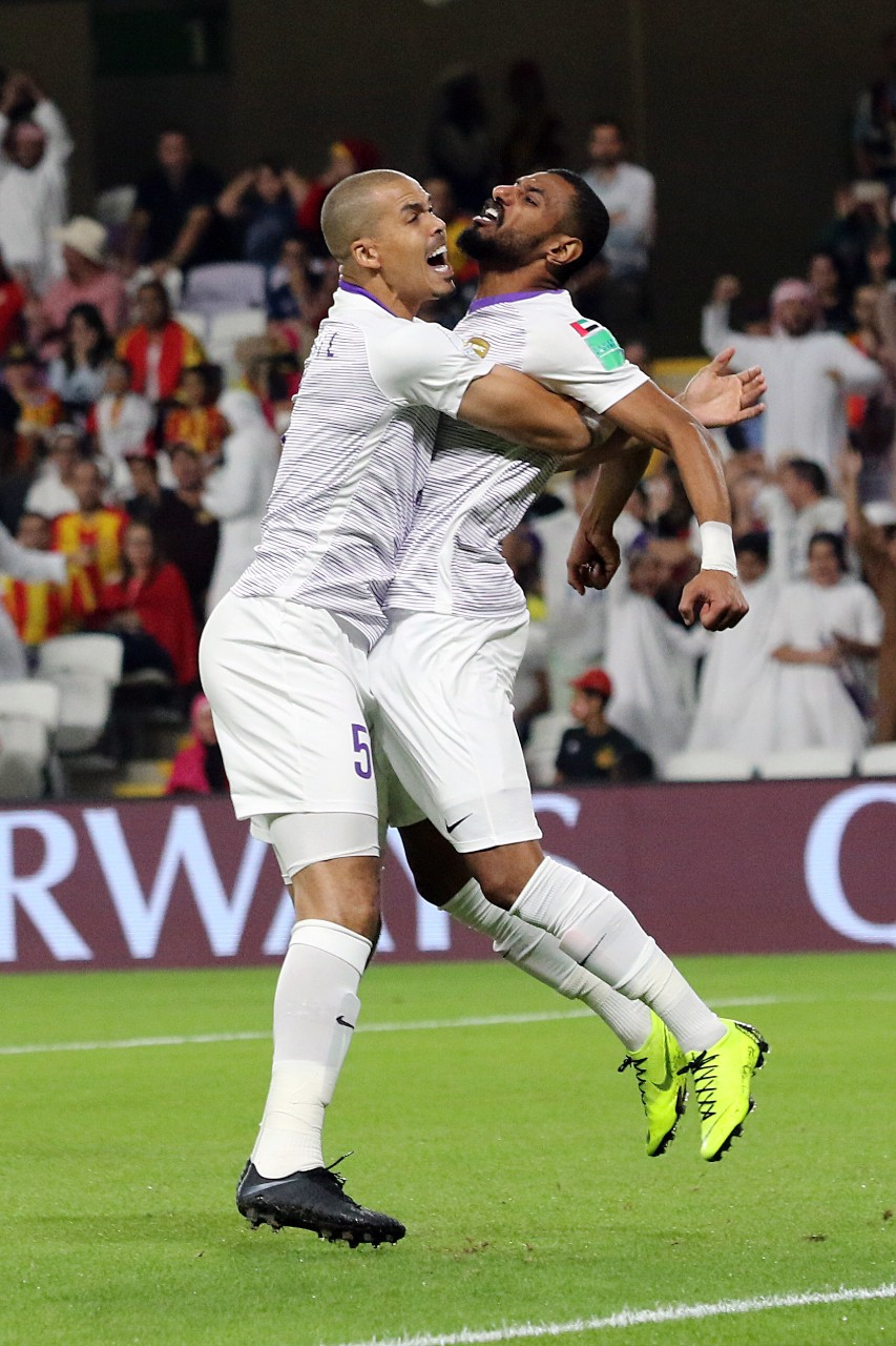 Players celebrating a goal during a World Cup match