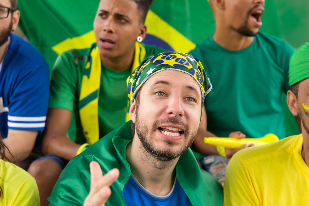 Enthusiastic fans showing their team spirit during a World Cup match