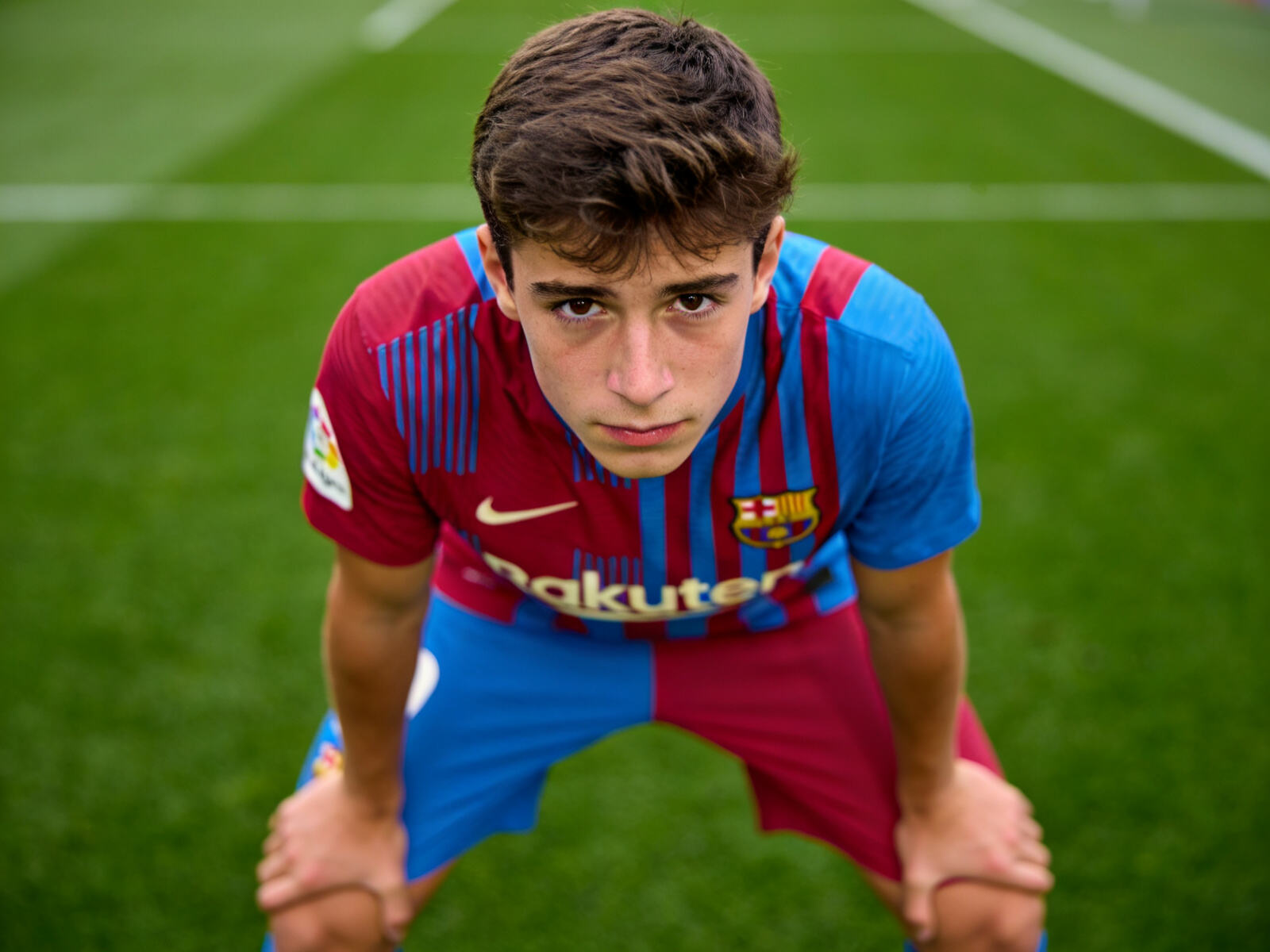 Young Barcelona defender Pau Cubars&iacute; makes a composed tackle. His kit appeals to fans who appreciate defensive artistry and rising stars.