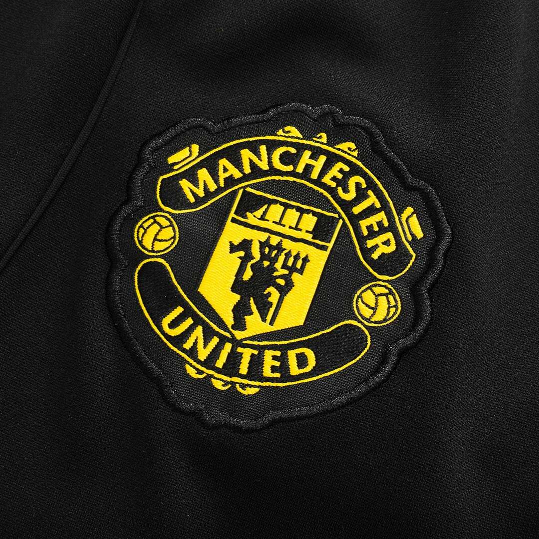 Manchester United 1/4 Zip Tracksuit 2025/26 Kids Black